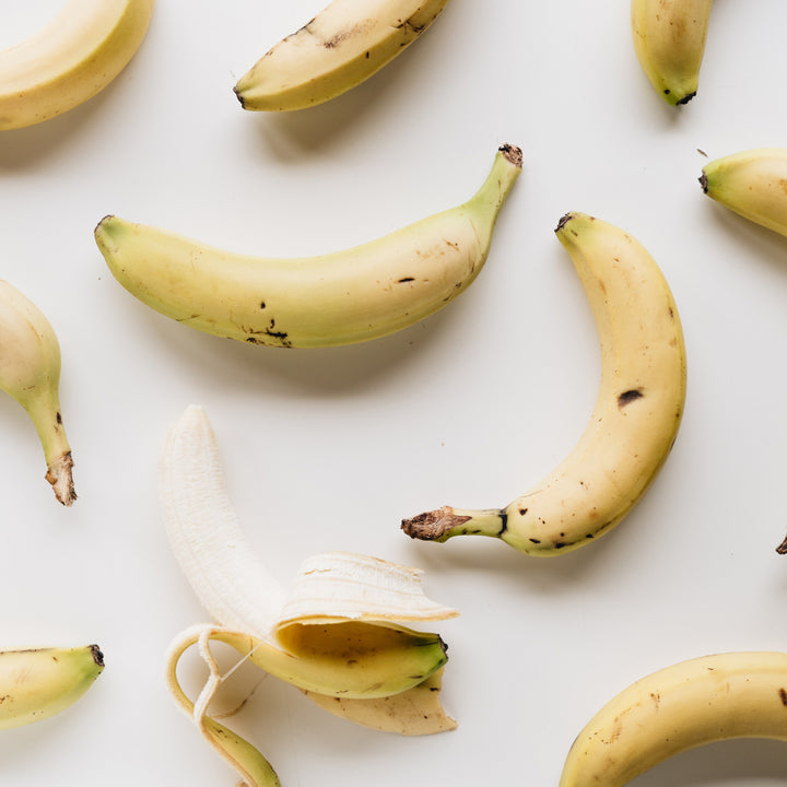 Bananas on a white surface