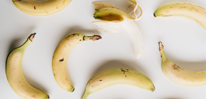 Bananas on a white surface